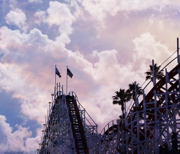clouds above amusement ride