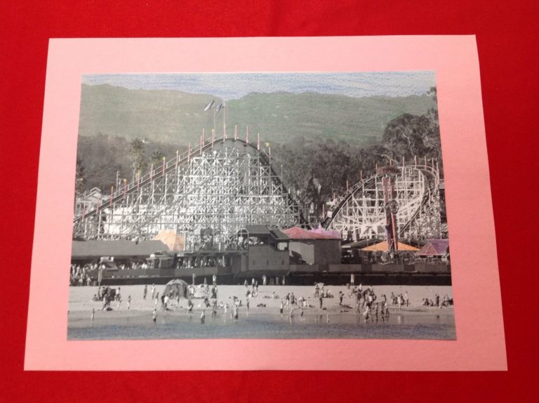 people on the beach in front of the giant dipper